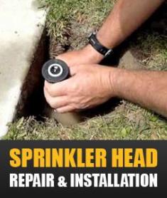 a professional tech is installing a new sprinkler head